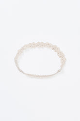 Avauma White Garden Band headband in Cream Beige with delicate bow embroidery, displayed flat on white background